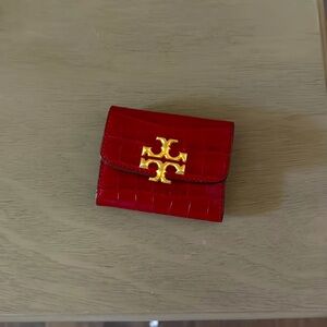 Tory Burch Burgundy small card holder/wallet Purchased from Tory Burch website.